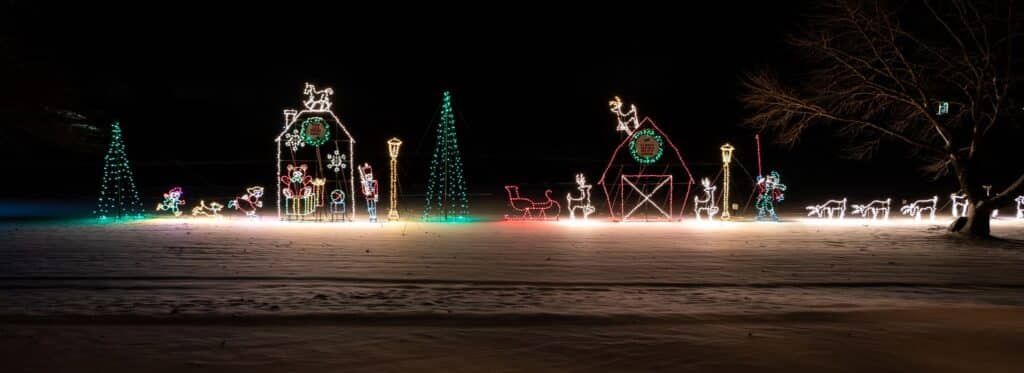 Christmas decorations shine on a snowy night at Lake Geneva's Grand Geneva.