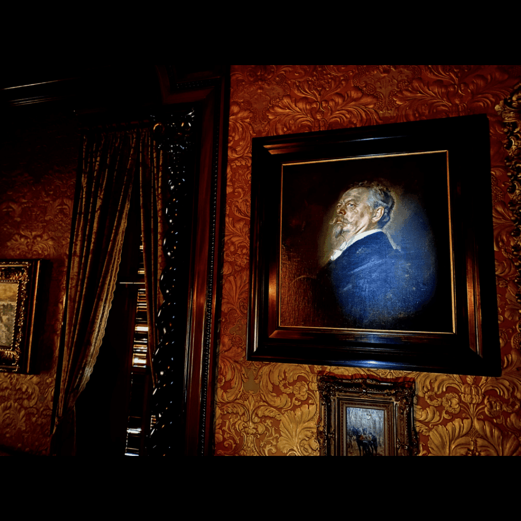 Portrait of Captain Pabst hanging in a dimly lit room of the stately Pabst Mansion in Milwaukee Wisconsin