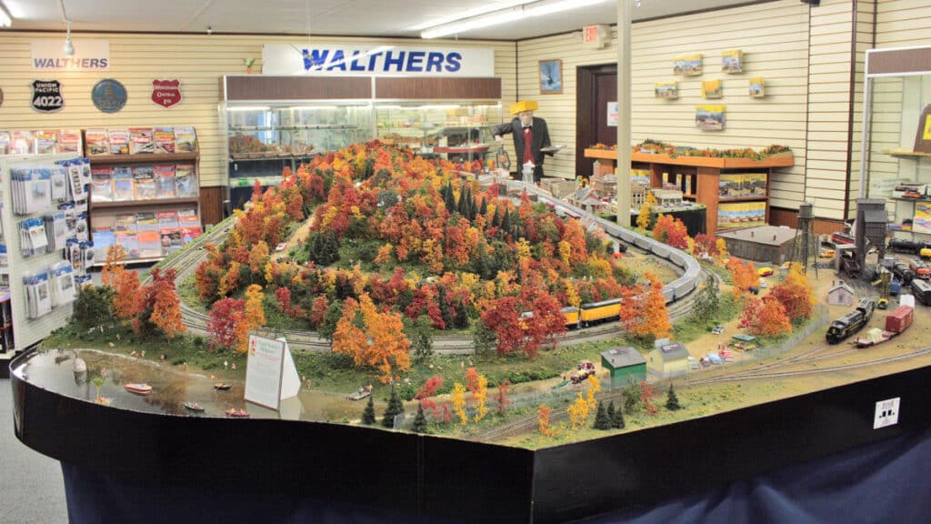 Miniature model train display with fall foliage set up inside of a train store in Milwaukee, Wisconsin.