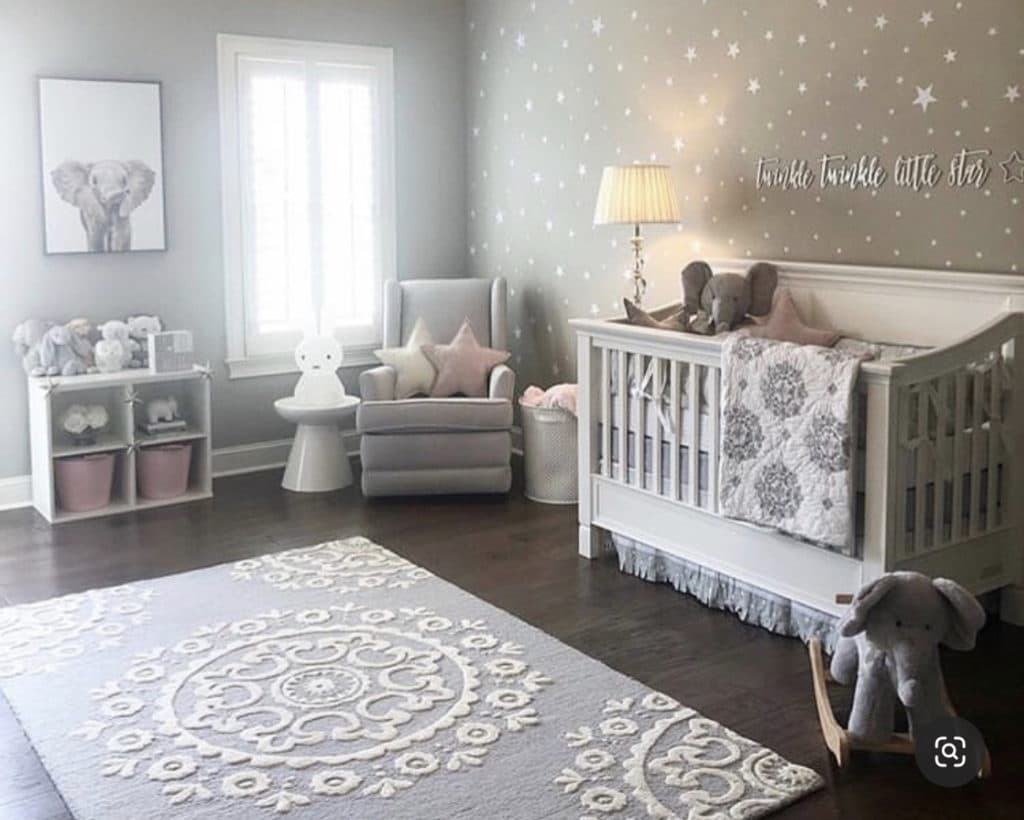 Baby girl nursery with muted gray walls, string lights, star stickers, elephant wall art Inspired by Twinkle, Twinkle Little Star theme.