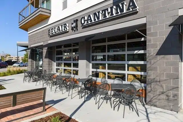 BelAir Cantina patio with outdoor tables and modern restaurant exterior in Milwaukee.