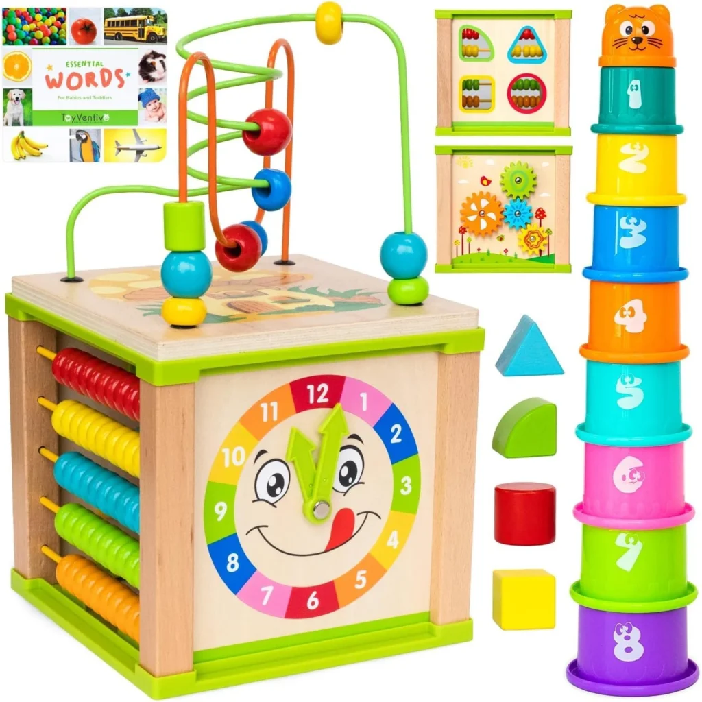 An activity cube with bead track, shape sorter and stacking cups