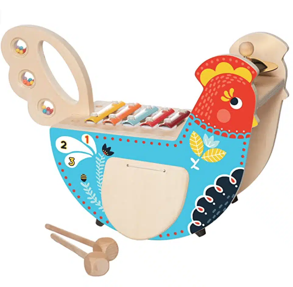 Musical instrument shaped like a chicken with xylophone bars and stick