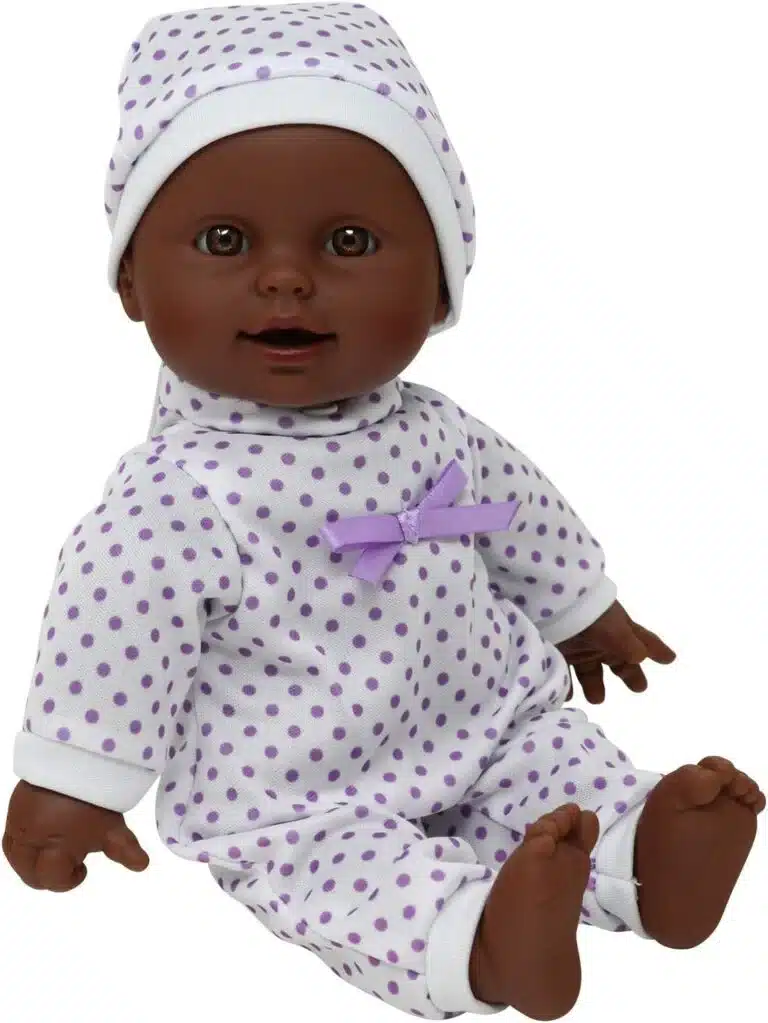 Baby doll toy dressed in pajamas for big sister pretend play