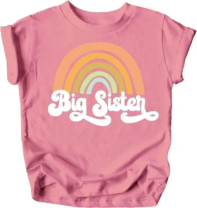 Pink T-Shirt with colorful rainbow over the text that says "Big Sister".