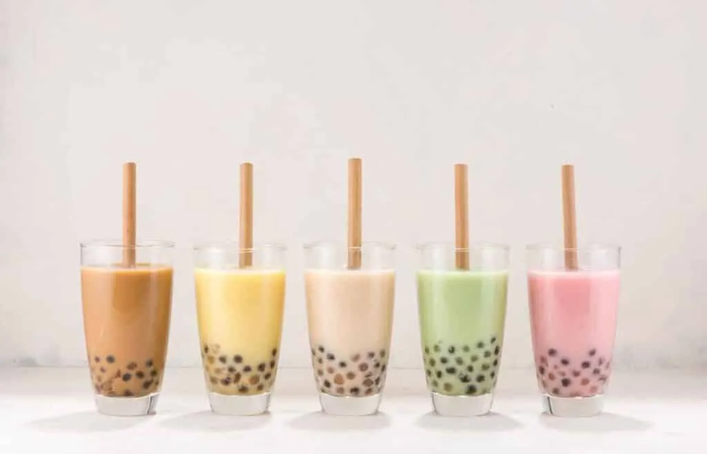 Colorful boba tea drinks lined up for a tween birthday party