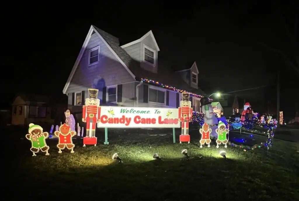 Front lawn holiday decorations featuring gingrebread men, toy soldiers and Santa Claus during the yearly Candy Cane Lane celebrations in West Allis