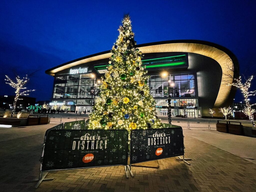A well-lit Christmas tree lighting at the Cheer District in Milwaukee.