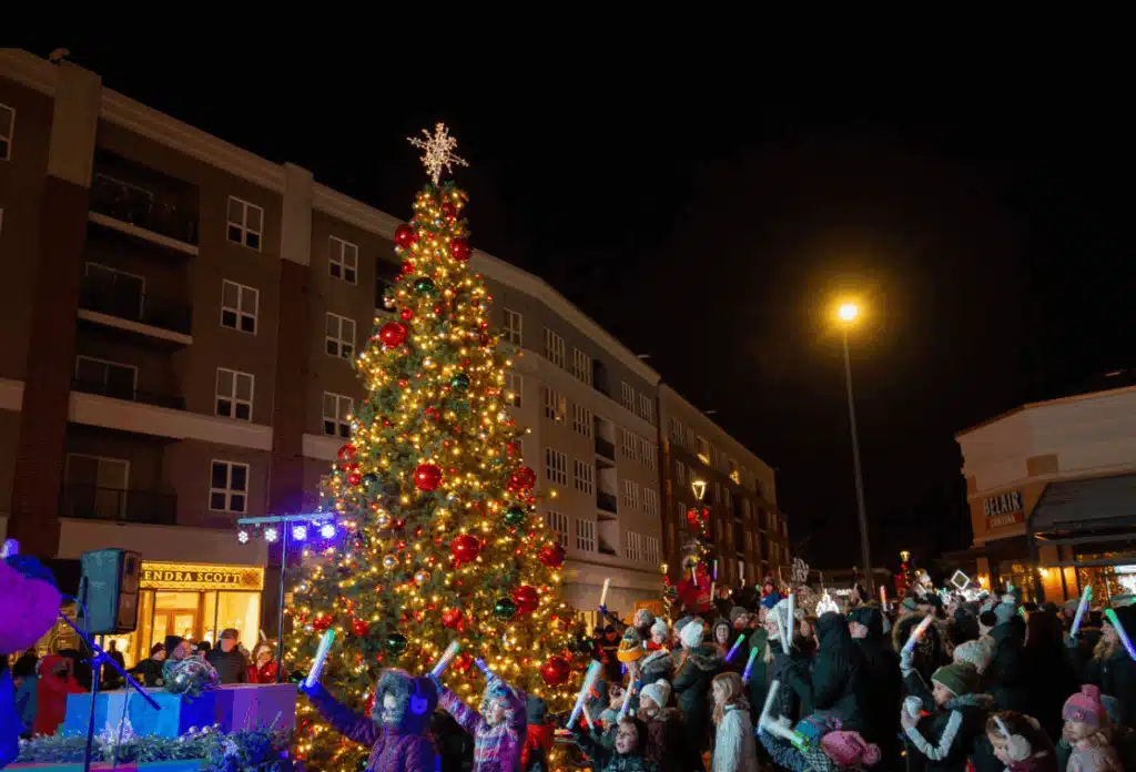 Families doing the countdown for the Christmas Tree lighting at the Corners of Brookfield.