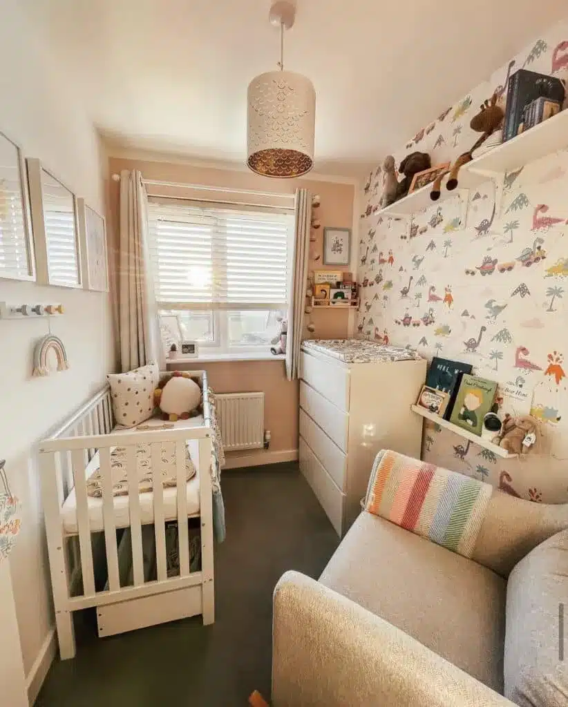 Dinosaur gender-neutral nursery with playful dino wallpaper and open shelving