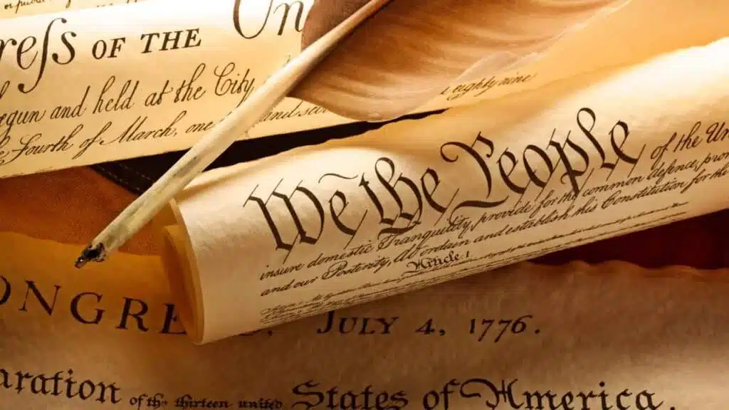 Scroll reading We the People from the U.S. Constitution.