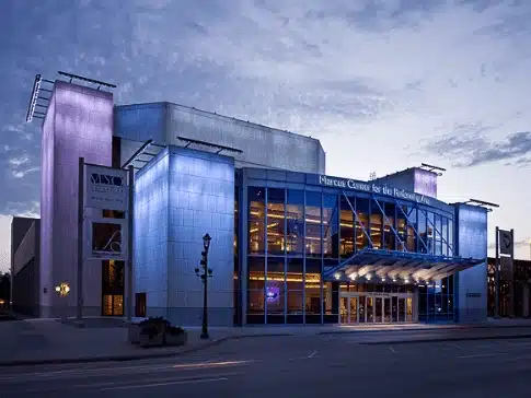 Marcus Center for the Performing Arts in downtown Milwaukee at dusk, showcasing modern architecture and city cultural attractions.