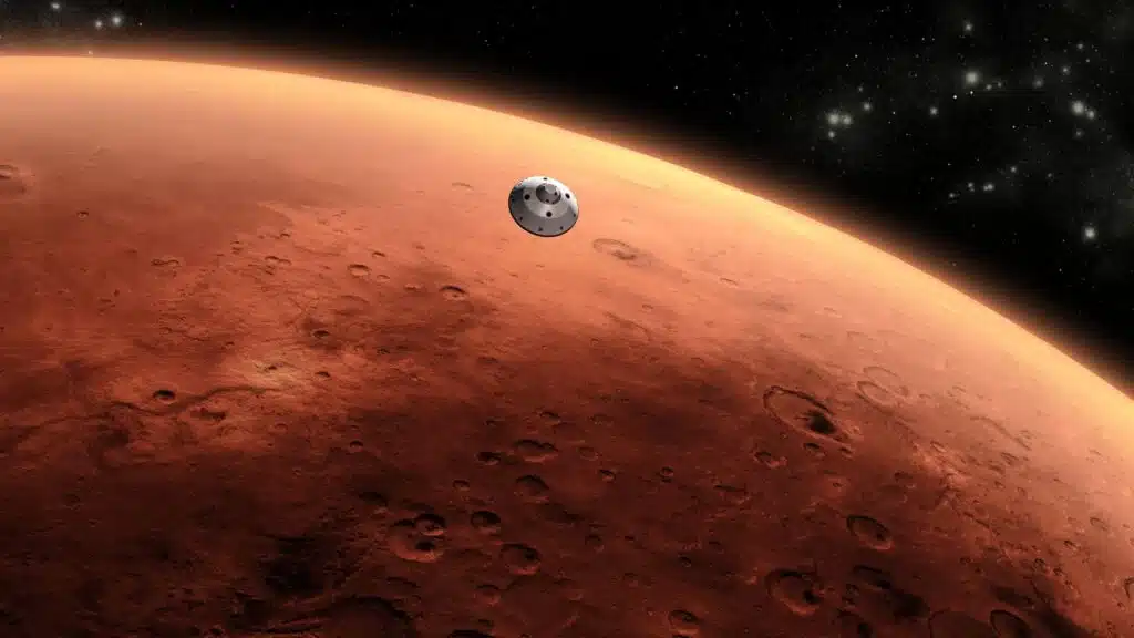 A spacecraft approaching Mars during a space mission, showing Mars craters.