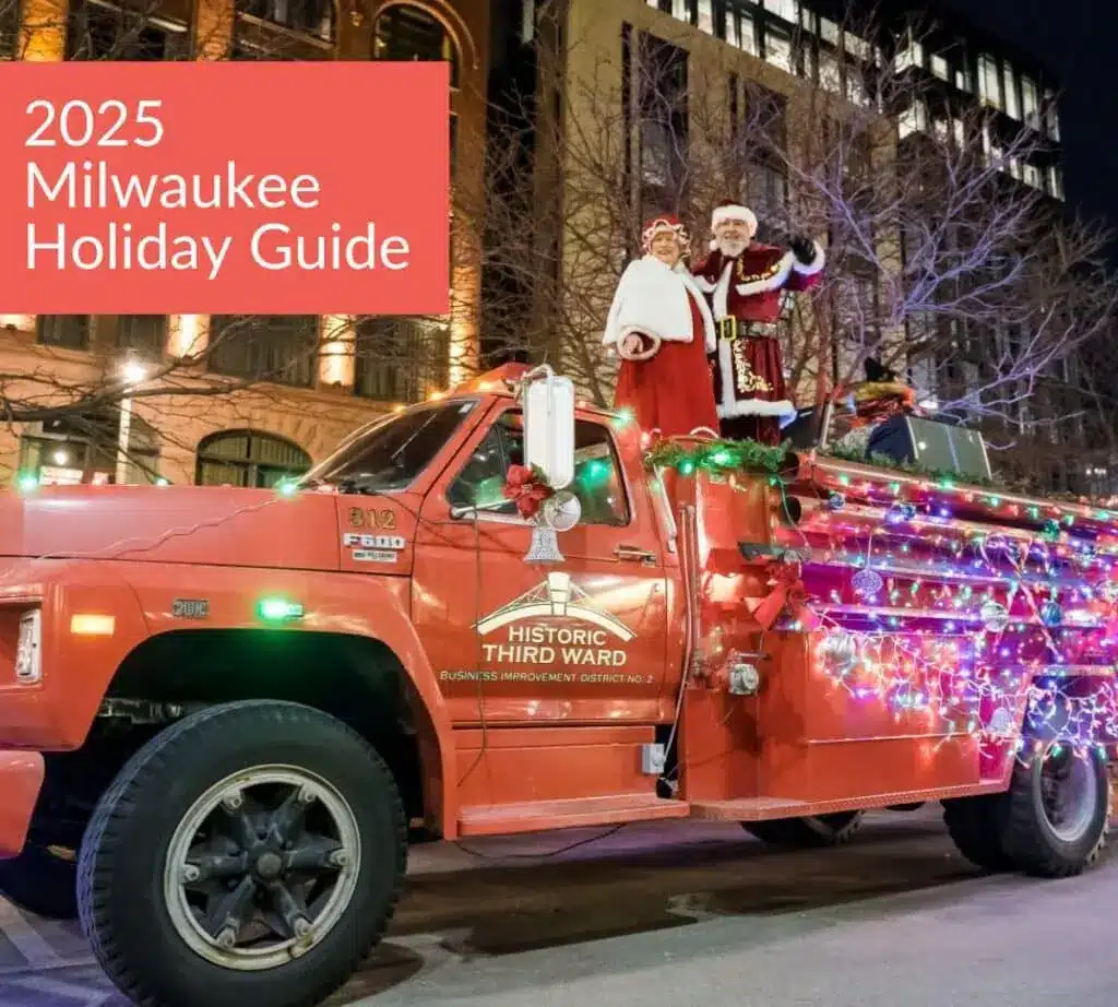 Santa and Mrs Clause on a red truck decorated with Christmas lights and poinsettias with text on upper left corner 2025 Milwaukee Holiday Guide.