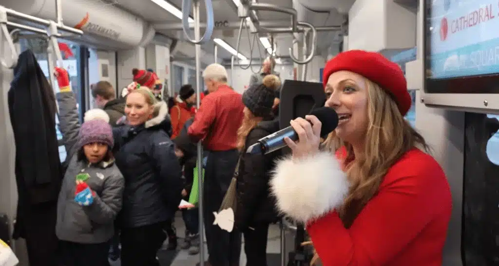 Singer performs holiday music aboard Milwaukee’s Hop streetcar