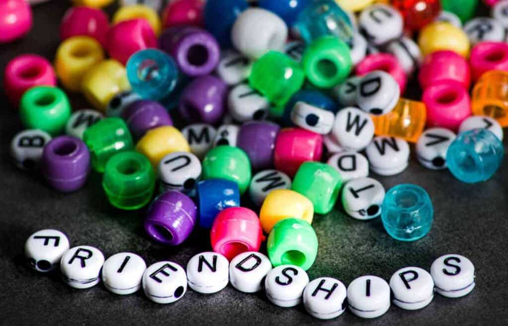 Colorful beads for bracelet with one spelled friendships