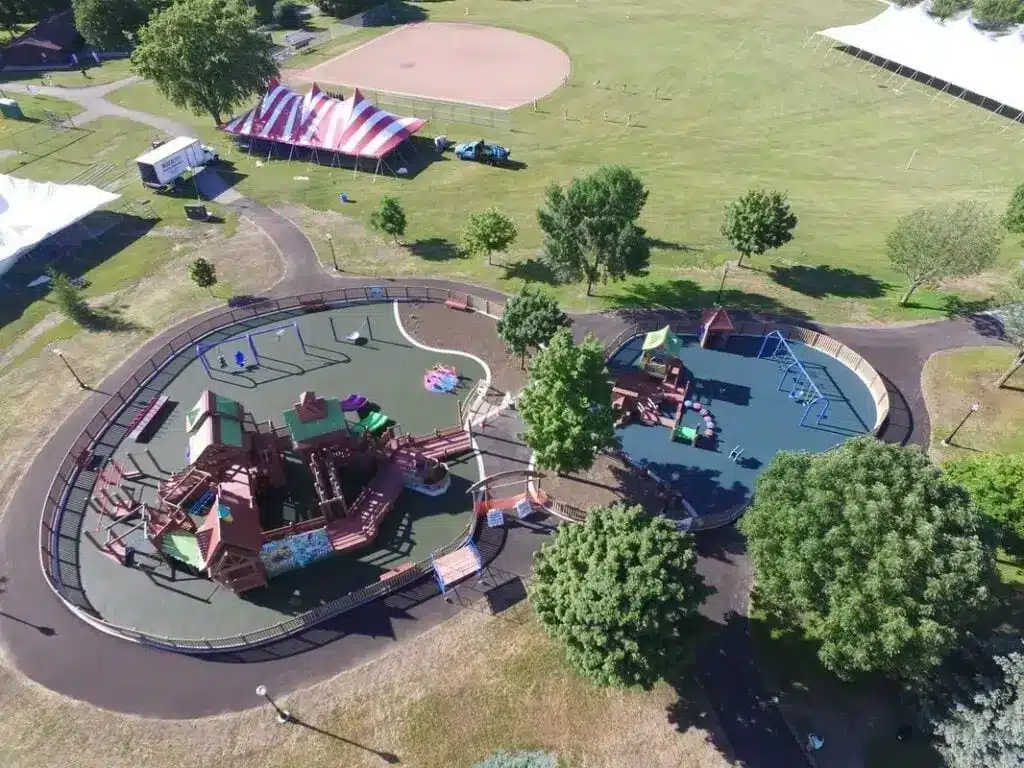 Aerial view of Malone Park’s large castle-inspired playground in New Berlin.