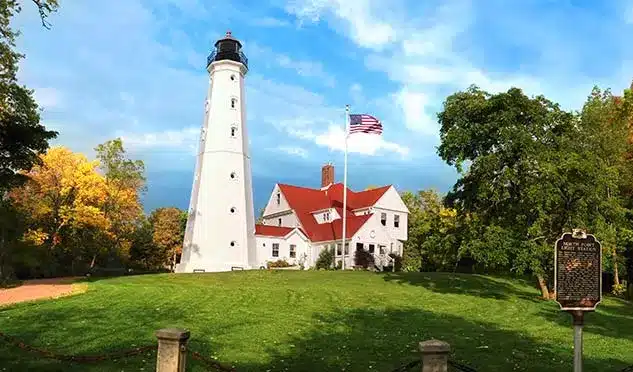 North Point Lighthouse in Milwaukee surrounded by fall colors