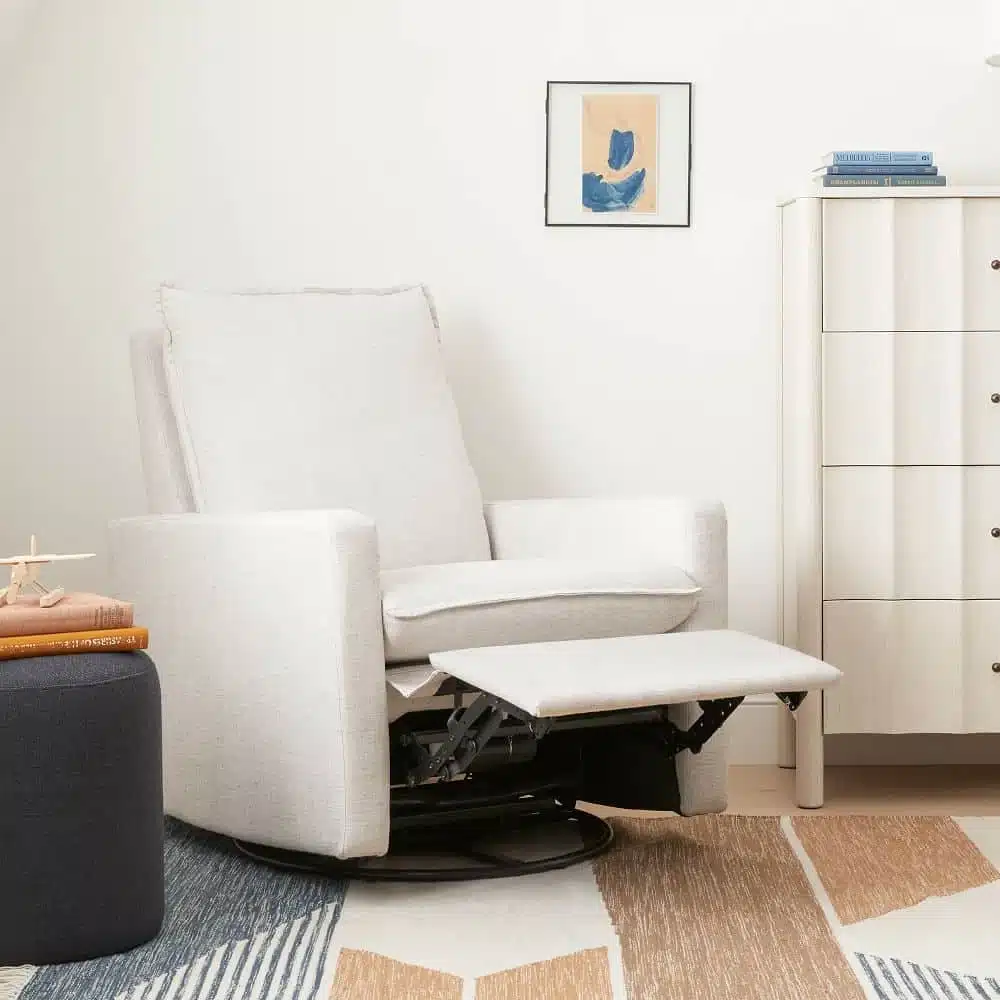 Paxton power recliner from West Elm Kids with grey side table and white cabinets