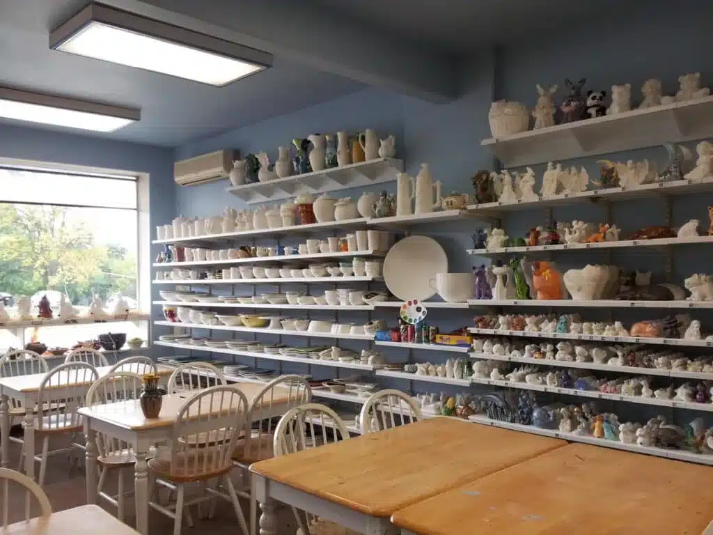 La Terraza paint-your-own pottery studio in Wauwatosa with shelves of ceramic pieces and tables for kids