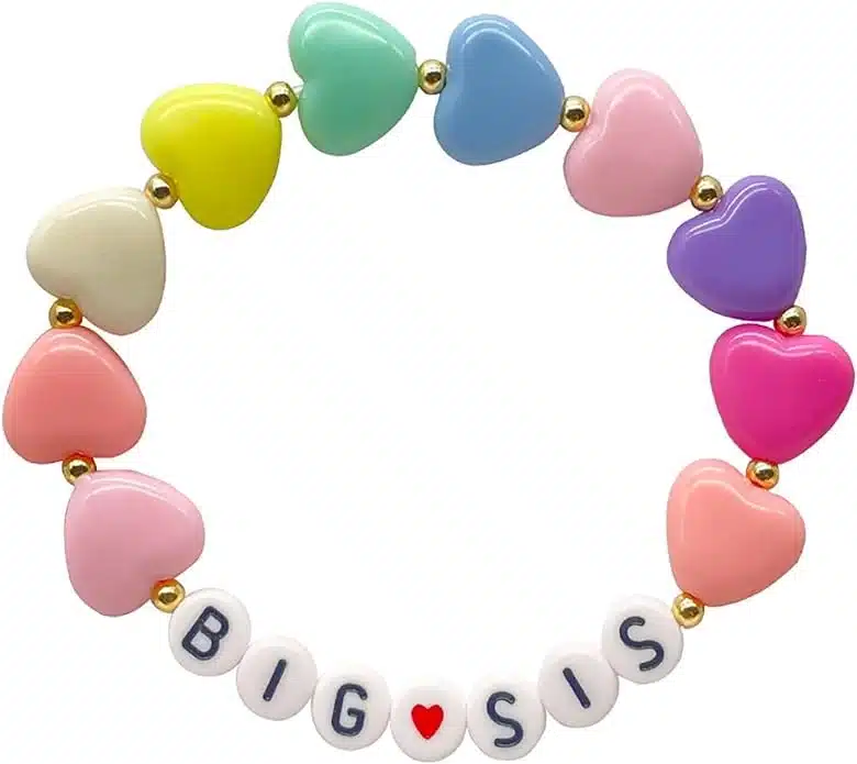 Beaded bracelet with rainbow colored hearts and text that says "Big Sis".