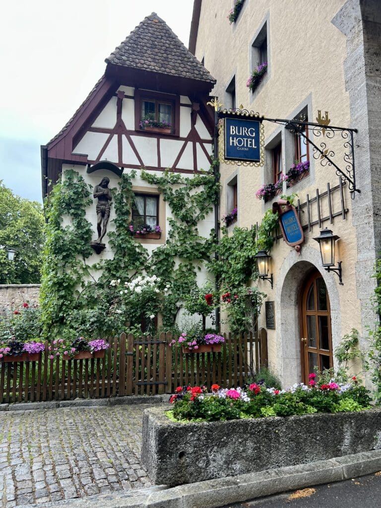 The Burg Hotel entrance with its creeeping wall vines, and summer flowers