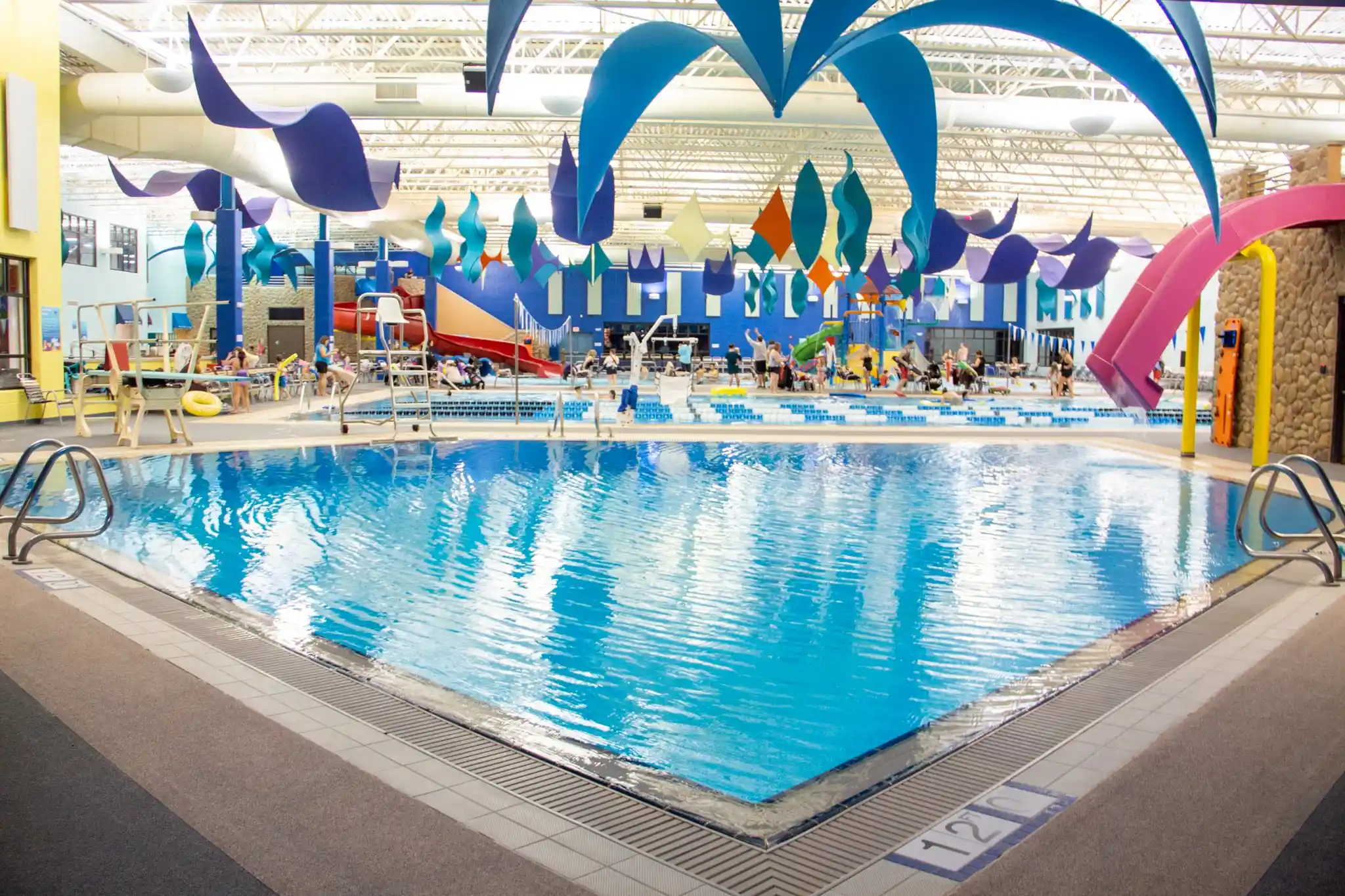 Indoor community pool with slides at The Water Works Schaumburg