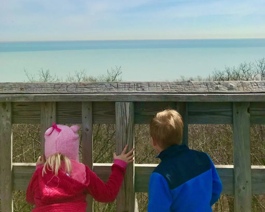 Kids take in the sweeping Lake Michigan view from the top of the observation tower.
