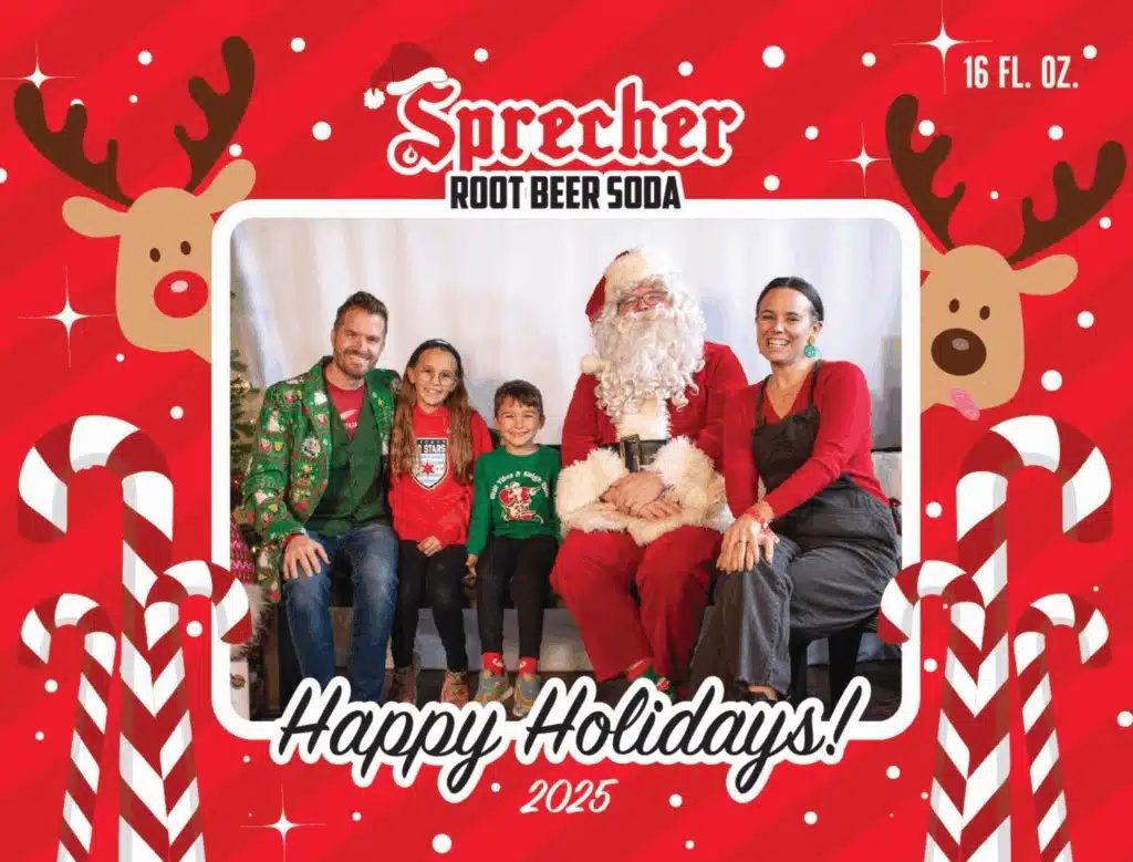 A family taking a photo with Santa Clause at Sprecher Brewery