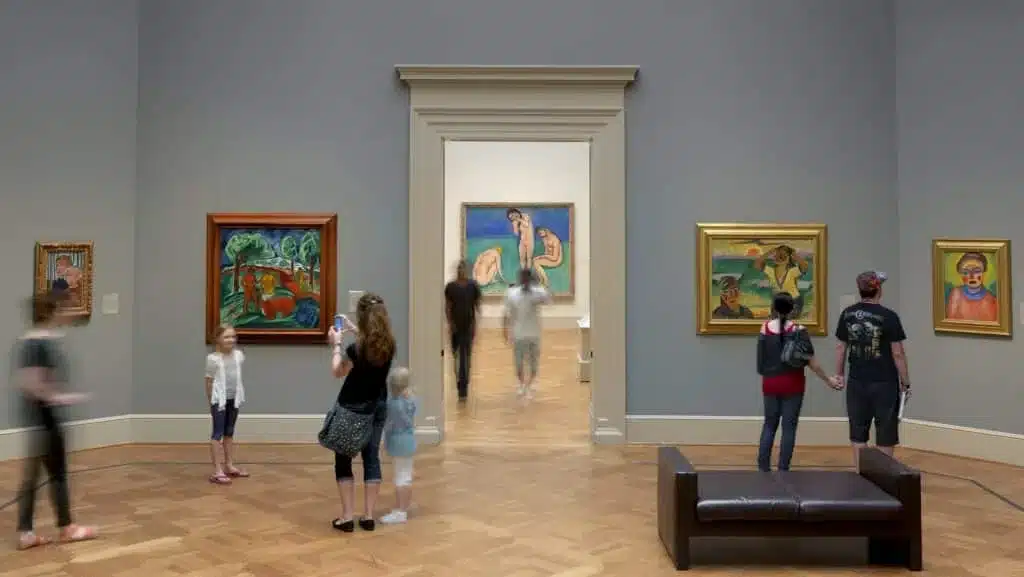 Families exploring free art galleries inside St. Louis Art Museum
