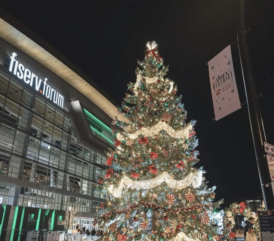 Families visiting the Christmas tree lighting at the Fiserve Forum in Milwaukee.