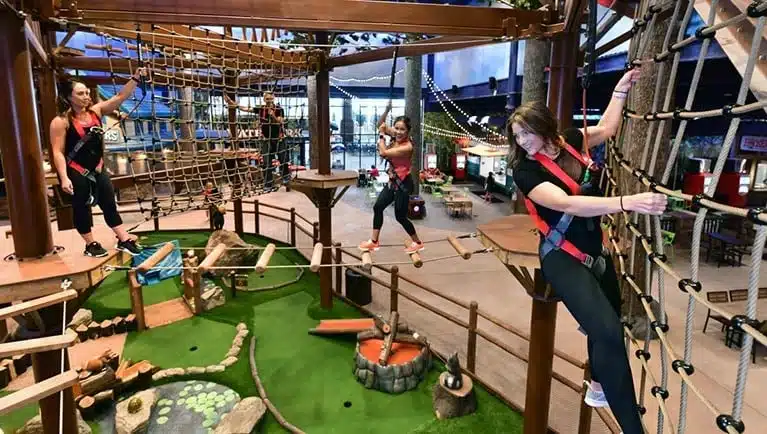 Guests navigate the indoor ropes course at Great Wolf Lodge in Wisconsin Dells